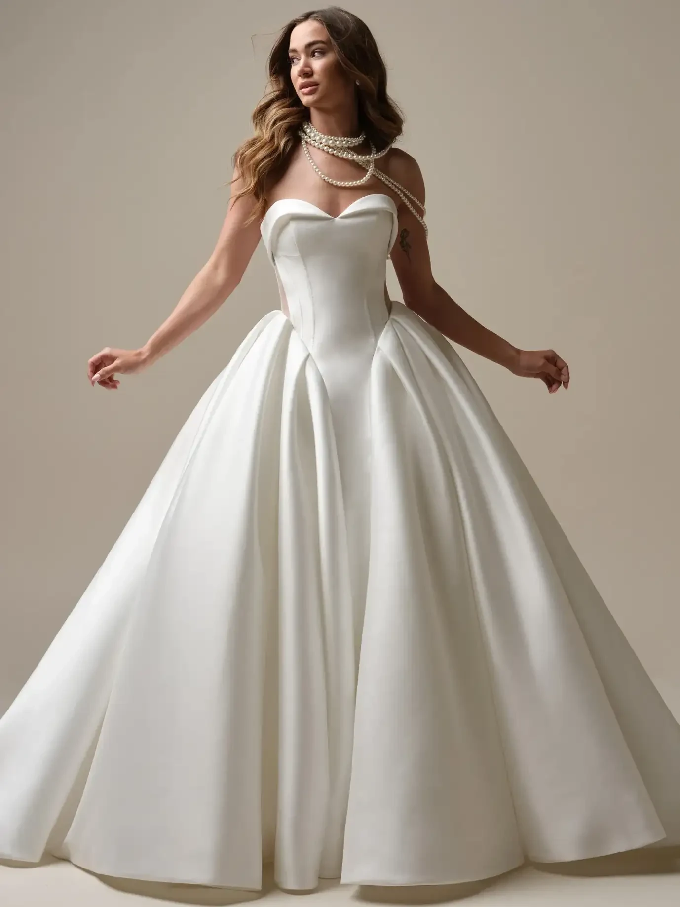 Model wearing a gown by Sottero & Midgley
