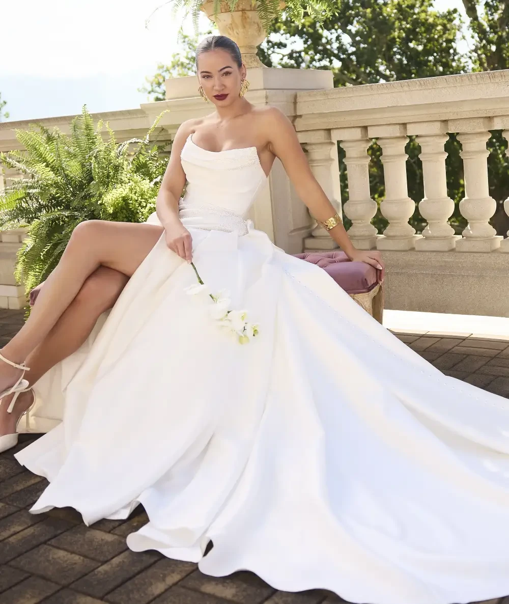 Model wearing a white bridal dress
