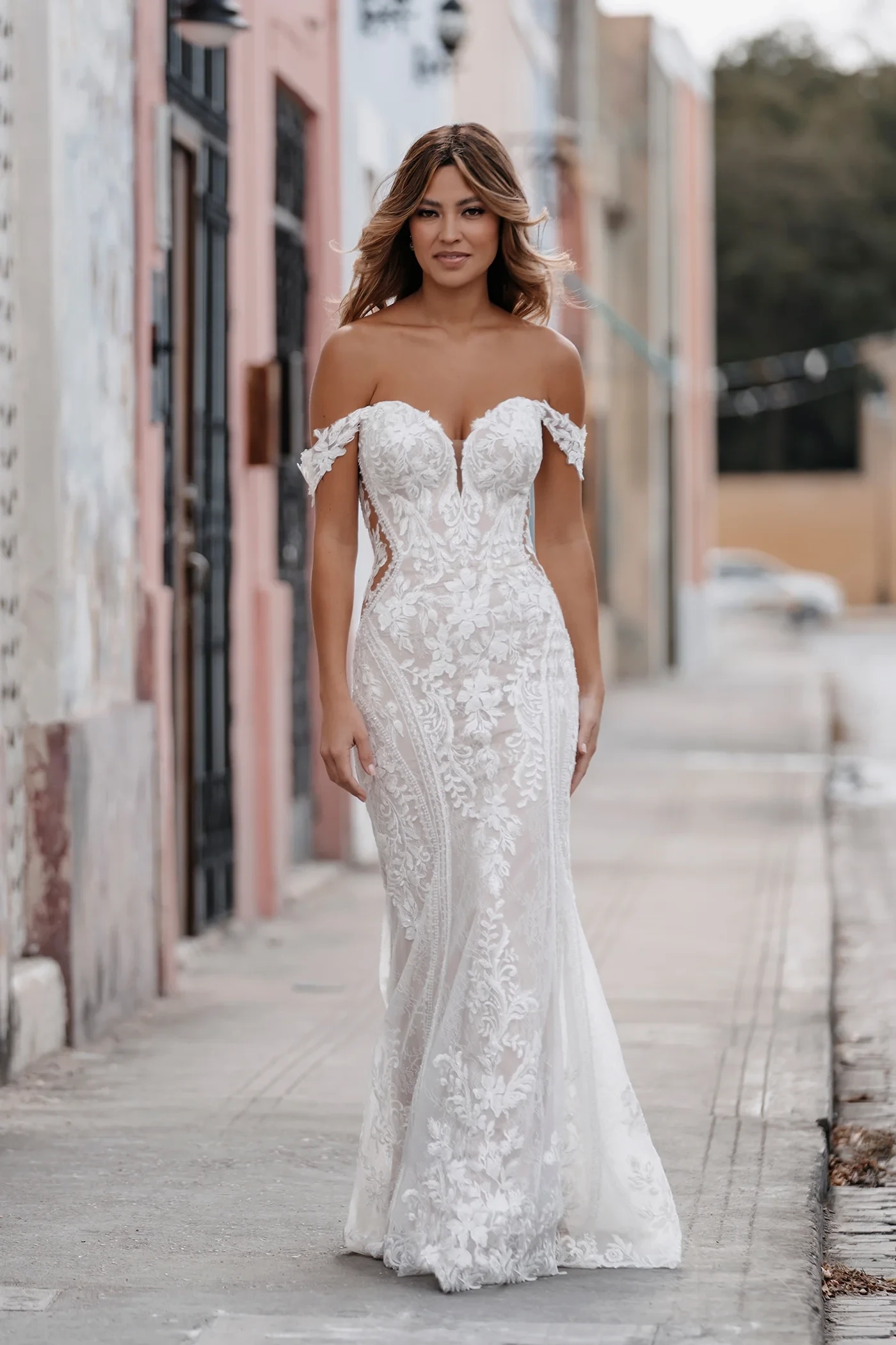 Model wearing a gown by Allure Bridals