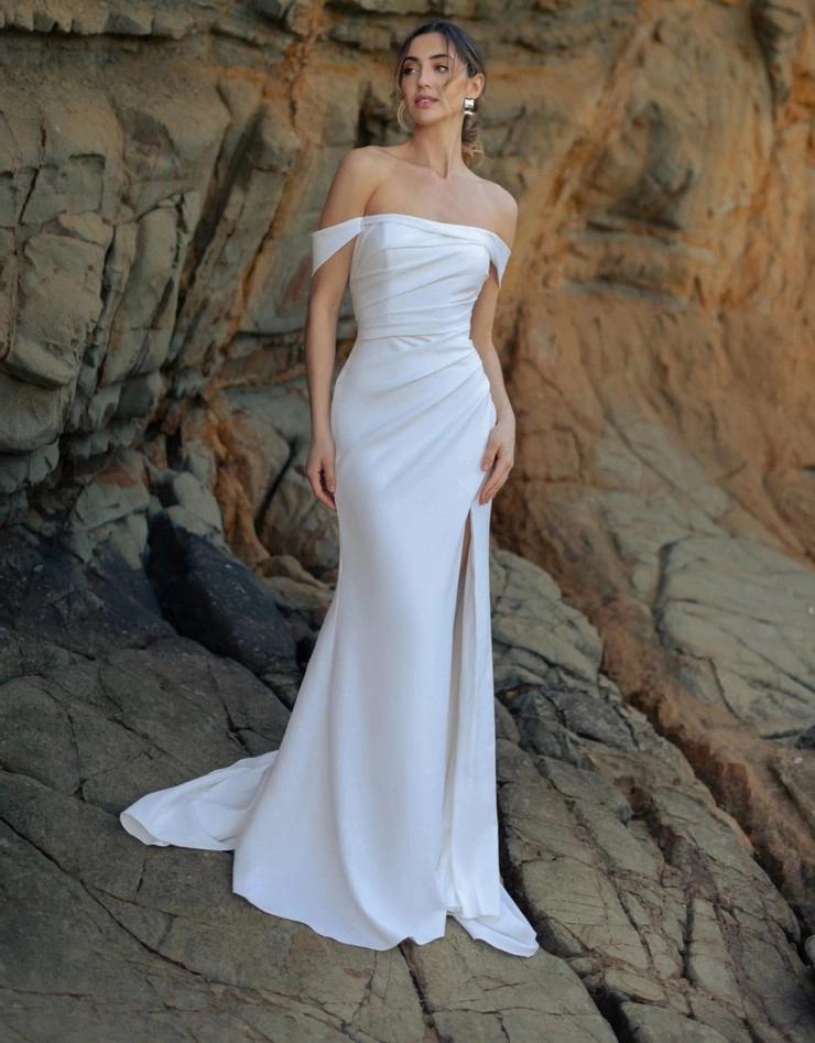 Model wearing a gown by Wilderly Bride